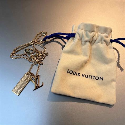 louis vuitton keyboard necklace.